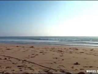 Goddess is on the beach and has dirty movie film there
