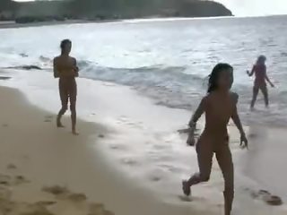Amia and Tanner frolicking public beach